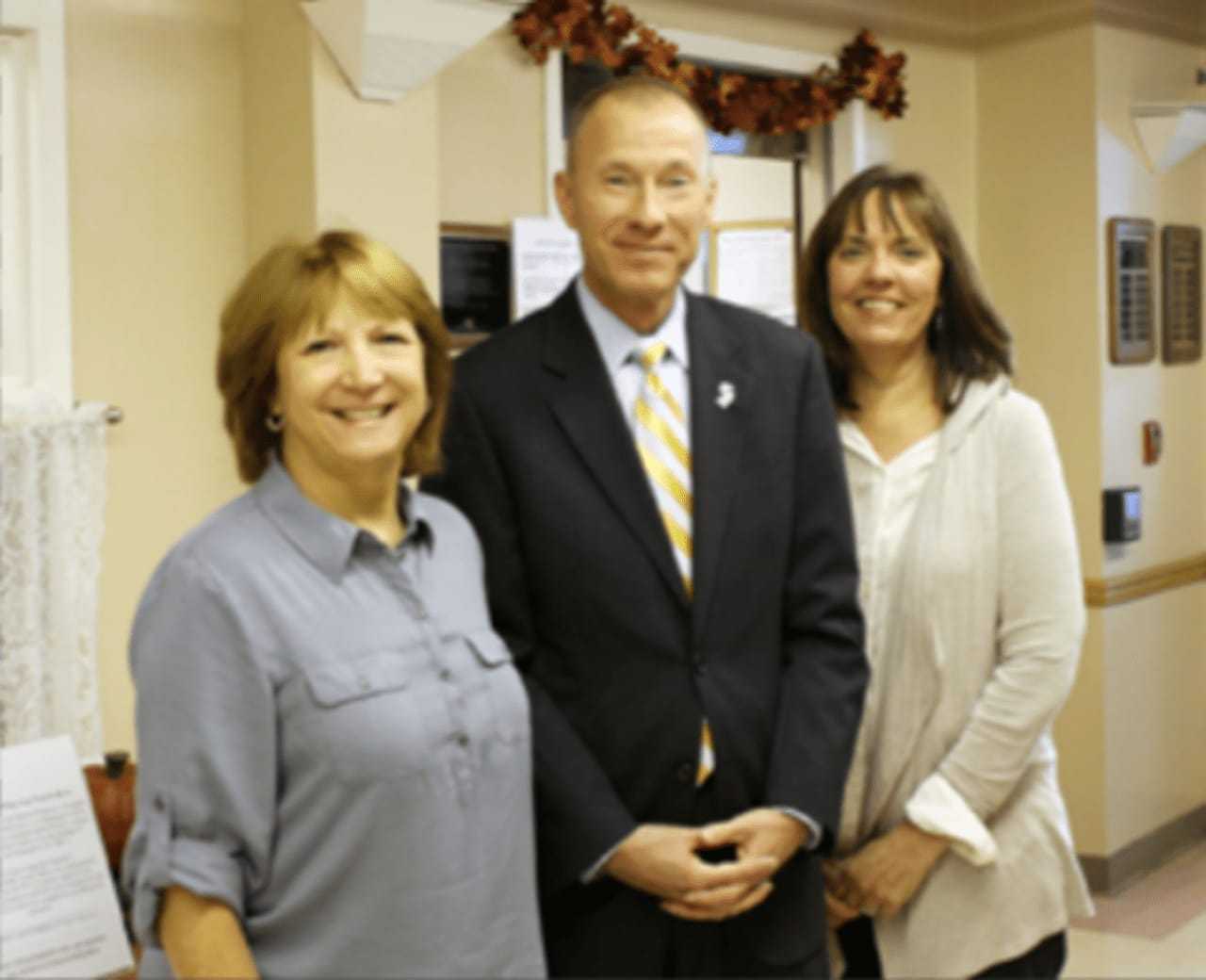 Kip Center Executive Director Peggy Letsche, Commissioner Ken Kobylowski, and Kip Center Program Coordinator Cathy Baviello,