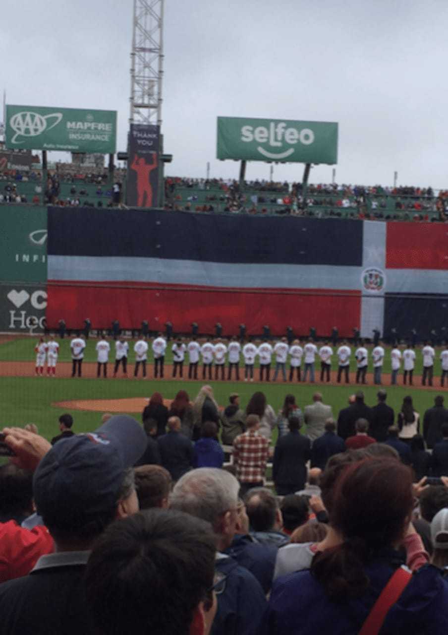Red Sox players line up as Mary J. Blige of Upper Saddle River sings at David Ortiz' final career game.