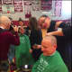 The hair shaving event fundraiser in progress at Bethel High School