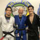 Galarza, left, with his coach, center, and his brother.