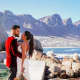 Marry Me In: Cape Town, South Africa. Nick and Zoe Aust are traveling the world, taking pictures in their wedding clothes. They quit their jobs and are funding the excursion with their life savings.