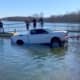 Emergency crews helped tow a pickup truck out of a Howell reservoir.