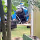 Scene of a crane collapse in Tinton Falls, as captured on video by Jacques John Guire. The front wheels of the cab of the tipped-over crane can be seen in this image.