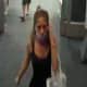An unidentified woman, captured on surveillance footage, who stole over $200 in cosmetics and another merchandise.