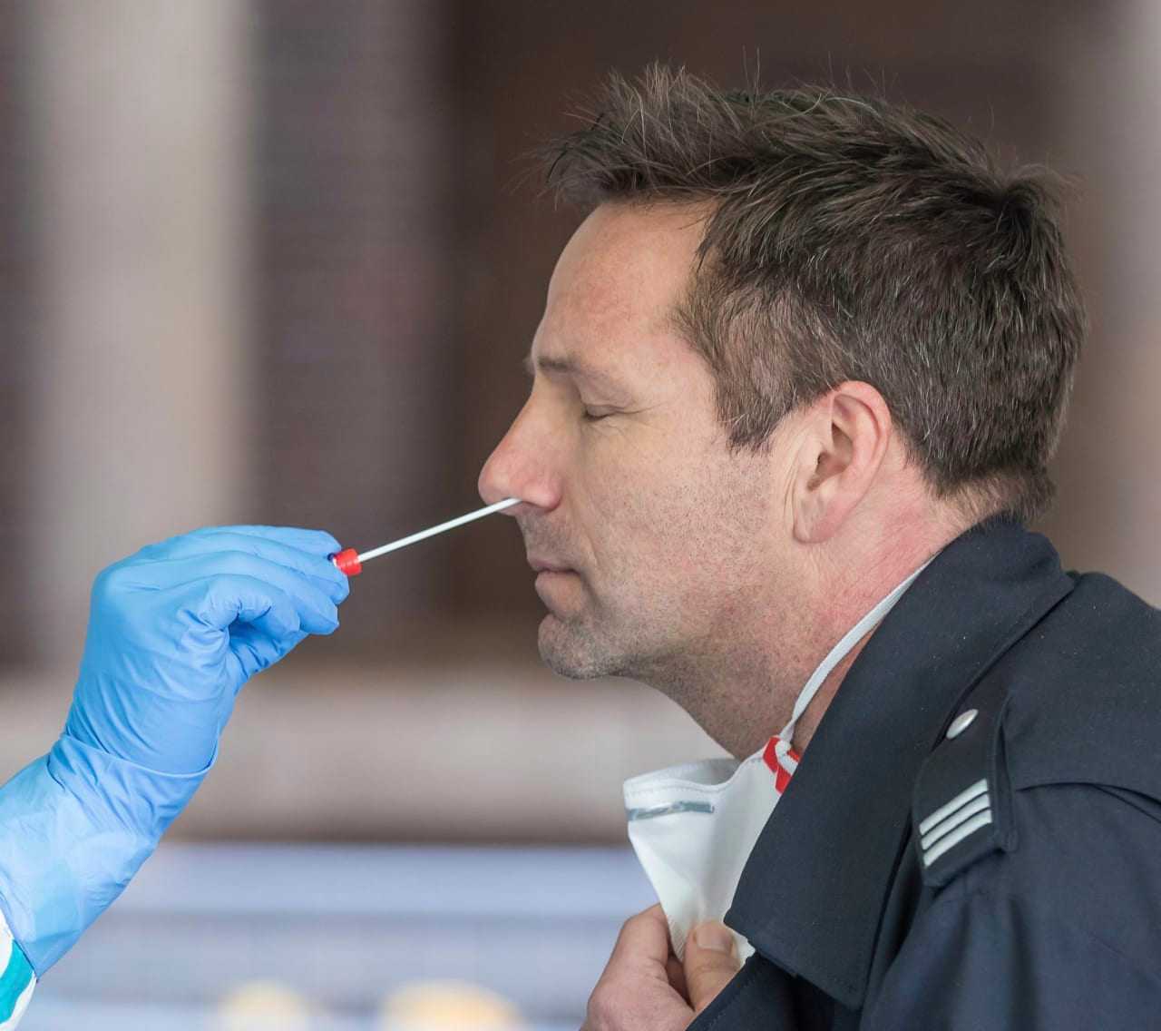 (Photo illustration) Rapid response COVID-19 tests typically swab a person's nose or throat to collect a sample.