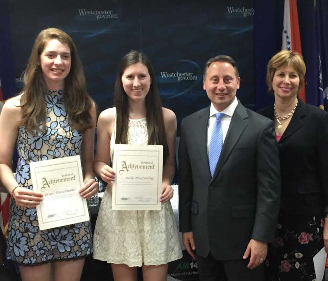 Lisa Wexler, right, and Rob Astorino present  Acorda Scientific Excellence Awards.