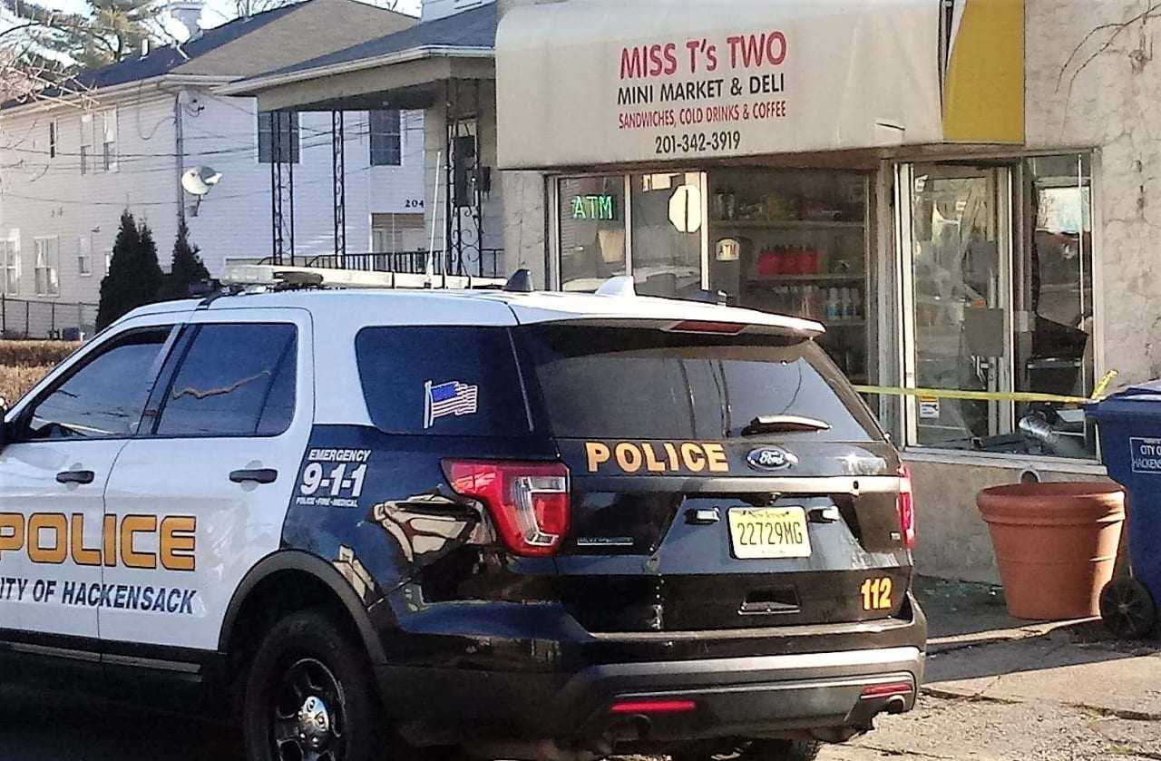 The front door window was smashed in the break-in at Miss T's Two on 1st Street in Hackensack.