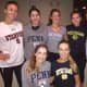 Girls from Connecticut Boat Club wear shirts with their college choices.