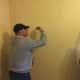 St. Matthew's Knights do some painting at Malta House in Norwalk