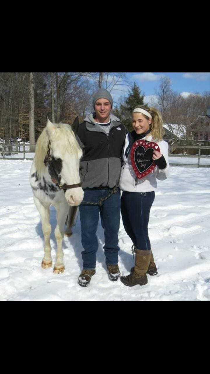 Danielle Cyr, right, of Bethel and her boyfriend, Gene Santossio, with Chance, a 15-year-old  Gypsy Vanner Cob cross who arrived in December severely underweight and needing significant medical attention.