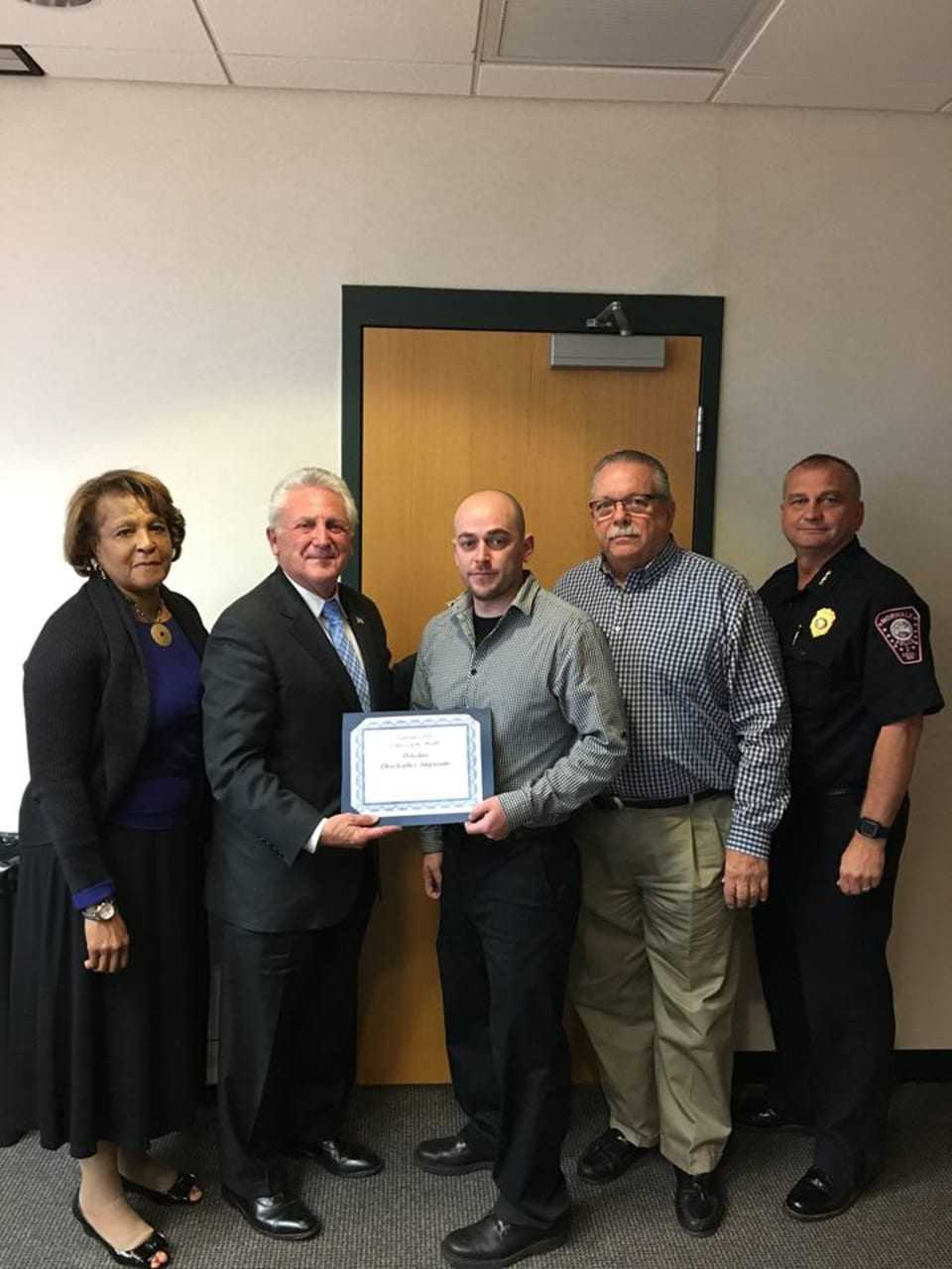 Commissioner Collier-Clemmons, Mayor Harry Rilling, Detective Imparato, Commissioner Yost and Chief Kulhawik