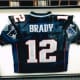 A framed jersey of New England quarterback Tom Brady is one of the unique pieces created by Geary Gallery.