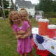 Twins sisters Grace and Kate O'Reilly sold drinks to help raise money for the Hastings American Legion Post 1195.