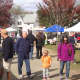 A sizable crowd comes out to celebrate the last day of the Muscoot Farmers Market this season.