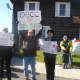 Ossining Boat and Canoe Club members protest the study to see if a restaurant should go in the club's building.