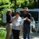 A Weir Farm volunteer gives directions to a visitors to the park in Wilton and Ridgefield. 