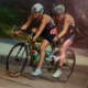 Amy Dixon, right, and Caroline Gaynor ride on the bike during the race. 