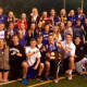 Members of Darien's boys and girls track teams celebrate after both squads won State Open championships Monday in Middletown.