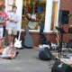Music lovers listening during a group's performance at the Taste of the Town Stroll Thursday in New Canaan.