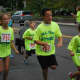 Young runners compete in a kids run at the All Out For Autism Friday in New Canaan.