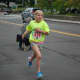 A girl cruises toward the finish line in Friday's All Out For Autism race in New Canaan. 