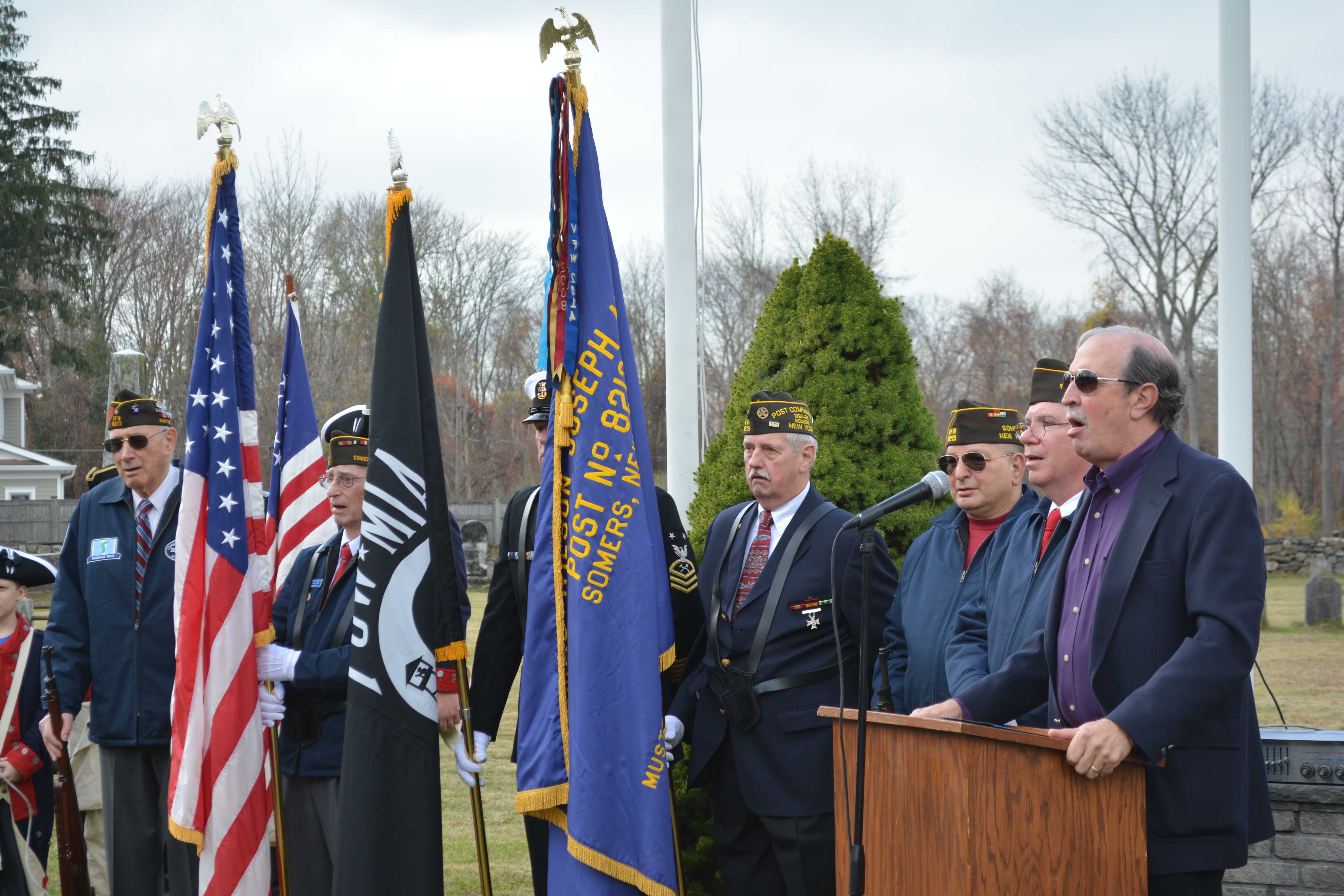 Dan Simpson sings "God Bless America."