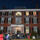 People gathered by the Elephant Hotel for Somers' holiday celebration.