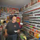 Joe Mazzullo, storeowner at Awesome Items in Harrison, describes some of his Lionel train collections.