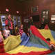 The parachute at the end of the performance thrilled the children. 