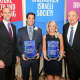 Jason Friedland of Scarsdale, left, presents a UJA Federation award to Daniel Singer, co-president of Robison Oil. Debra Abrahams Weiner, second from right, receives an award from her presenter, the Honorable Samuel G. Fredman of White Plains
