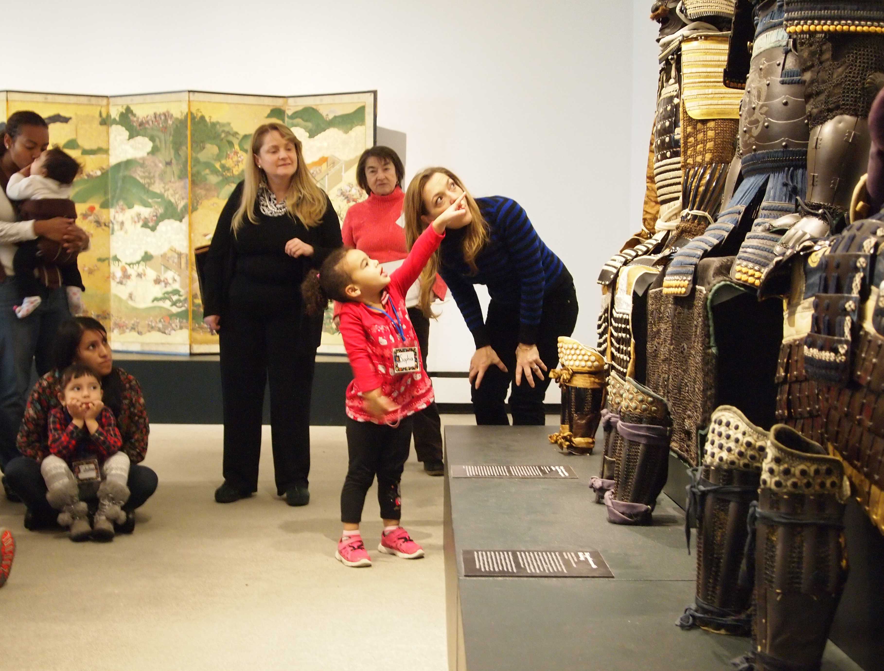 Families from the First Steps Little School in Ossining visit the Katonah Museum of Art as part of the ArteJuntos/ArtTogether program.