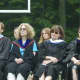 Faculty members watch Thursday's graduation ceremony.