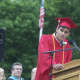 Graduating senior Shaan Appel speaks in front of the crowd.