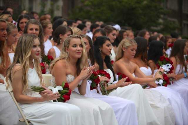 Red roses and white gowns were the order of the day at Bronxville High School's 93rd annual commencement.