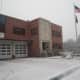 Snow falls on Briarcliff Manor's Village Hall and Fire Department Headquarters Wednesday afternoon during the nor'easter.