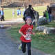 Dixie D'Amelo of the New Canaan Running Club runs in Sunday's race.