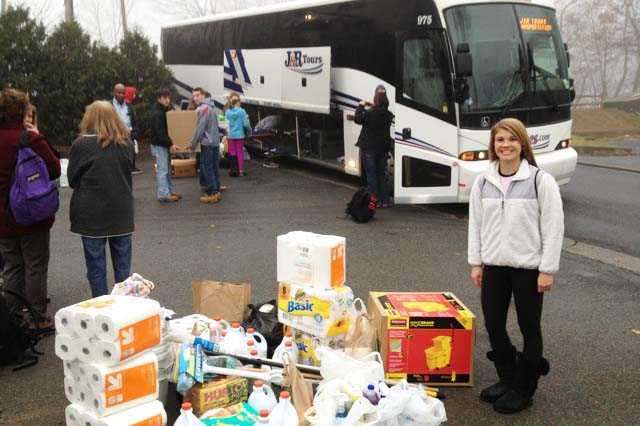 J&R Tours of Mount Vernon provided discount transportation Sunday as members of Let's Play It Forward in Somers delivered hurricane relief supplies to Staten Island.