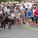 Runners take off at last year's MarcUs For Change 5K in Stamford, Conn.