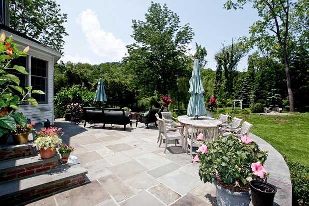 The property at 7 King's Grant Way also incudes a stone patio