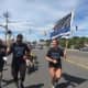 Norwalk officers on Westport Avenue while taking part in the Special Olympics Connecticut Law Enforcement Torch Run on Friday.