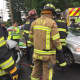 Trumbull fire crews extricated patients from a three-car crash on White Plains Road Friday morning.