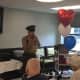 Petty Officer Jim Cava, U.S. Navy Ret., visited the Northern Metropolitan on Memorial Day to help the residents celebrate.