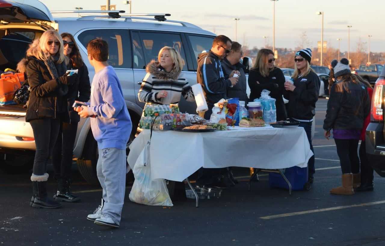 Mahwah fans tailgate outside MetLife Stadium before the football state finals Friday, Dec. 4. 