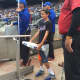 Bailey Blood was invited onto the field to change bases in between innings during Sunday's Mets game.