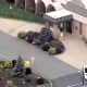 NBC's Chopper 4 got an aerial shot of people in heavy protective gear preparing the buses at St. Joseph’s Senior Home in Woodbridge last week.