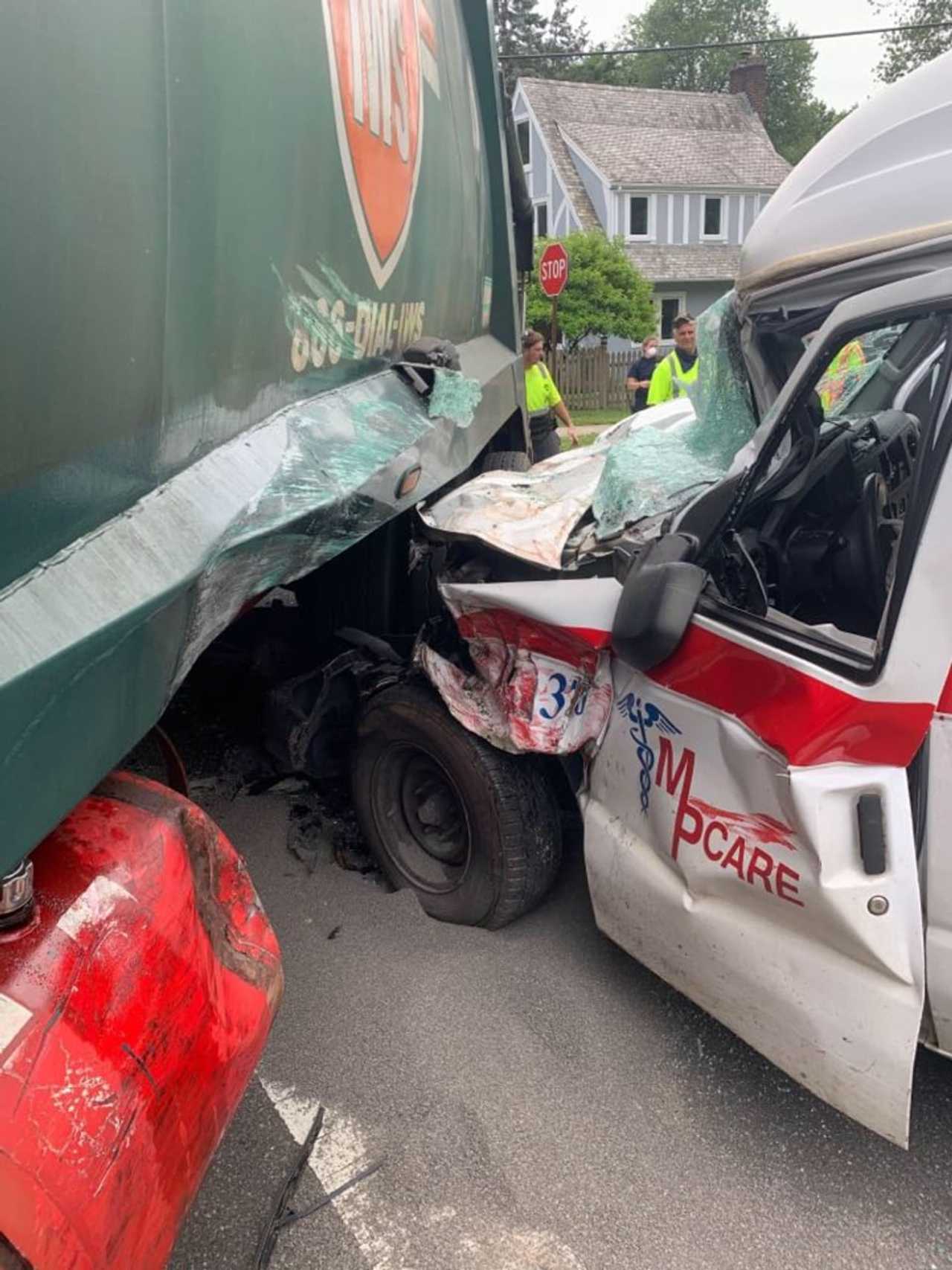 Ambulance Driver Ejected In Norwood Garbage Truck Crash Ridgefield