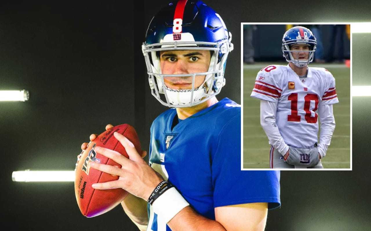 New York Giants starting quarterback Eli Manning rolls out to the