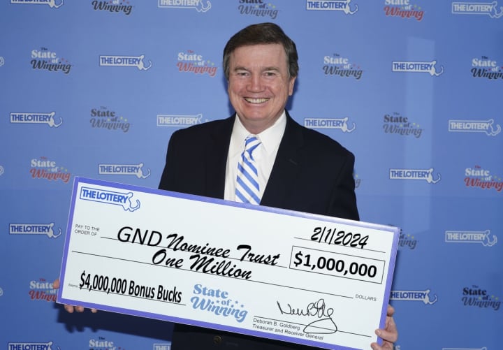 David Spillane, a representative of GND Nominee Trust of Quincy, collected the $1 million check for the ticket purchased in Shrewsbury.&nbsp;