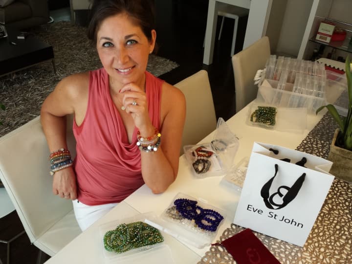 Eve St. John, yoga teacher and owner of Eve St. John, LLC, which handcrafts inspirational bracelets and meditation kits.