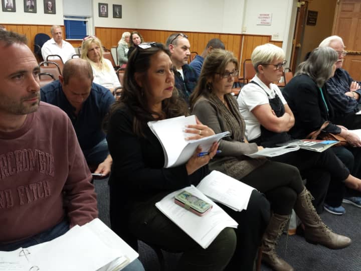 A crowd of people assembled at the Emerson Borough Council meeting, many in favor of an ordinance that would ban the sale of puppy mill dogs.